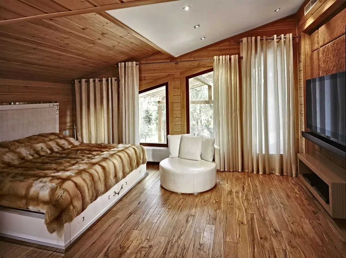 Интерьер в доме из бревна в современном стиле спальня